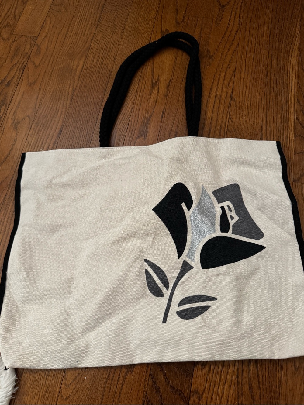 Lancome Cream Canvas Tote with Black Floral Motif